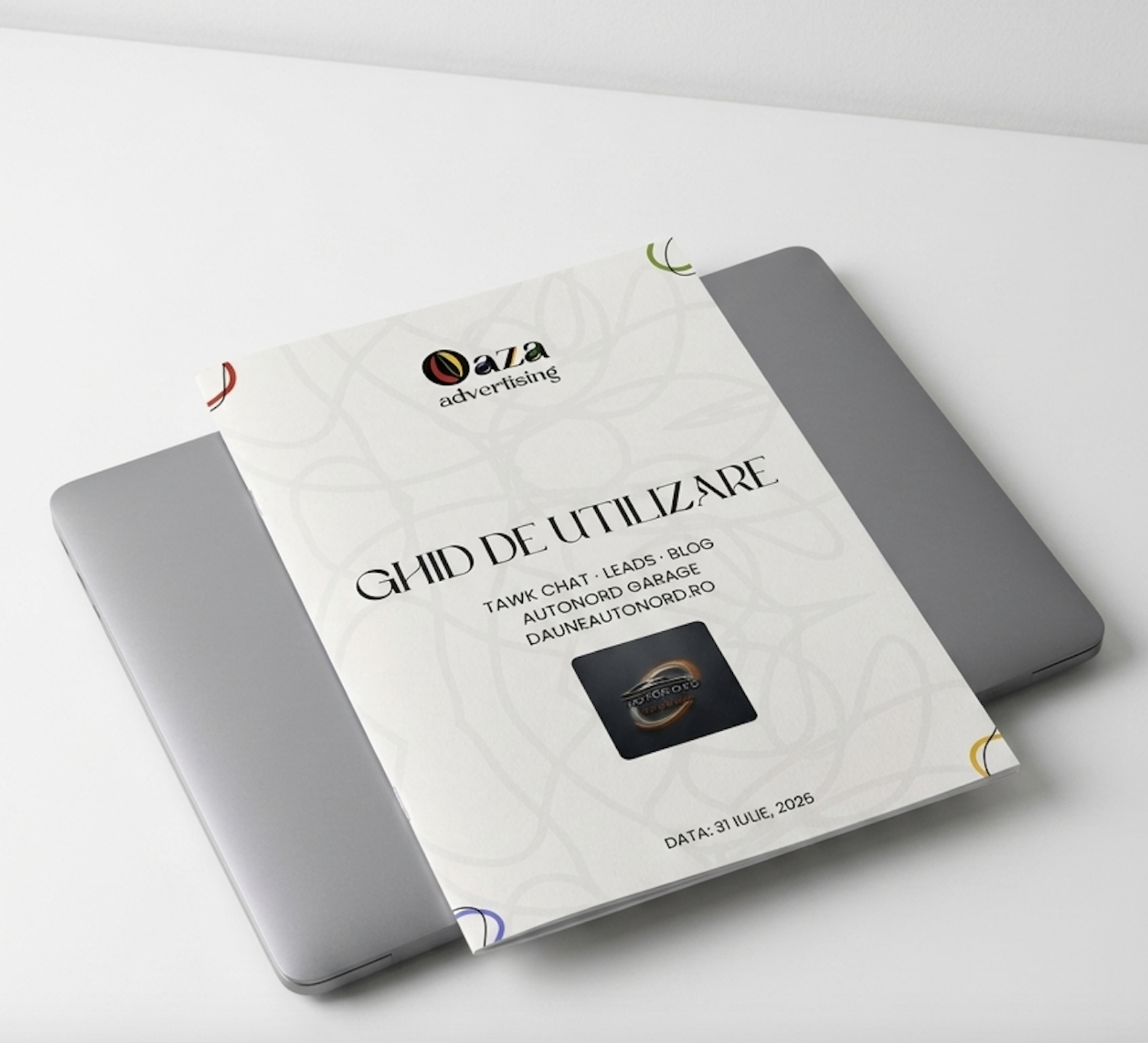 Autonord Garage — printed usage guide resting on a closed laptop